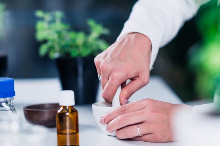 Pharmacist preparing compounded medication